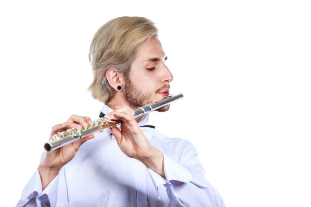 istock Male flutist playing his flute 862229636