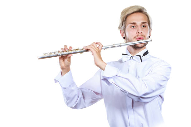 istock Male flutist playing his flute 862229798