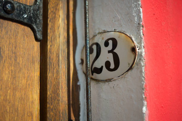 istock Number 23 metal plate on a white wall 862231150