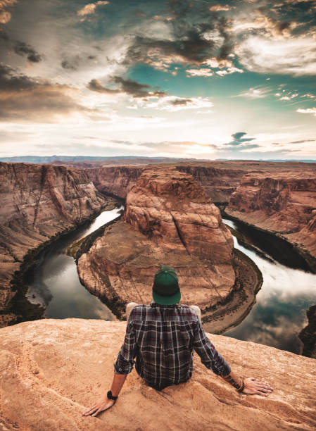 istock man resting at horseshoe bend in usa 862233446