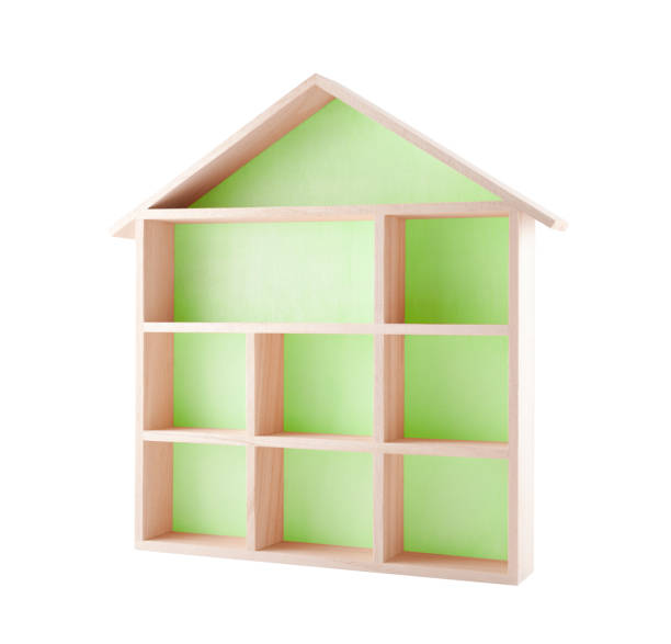 istock Green wooden house shaped shelf isolated on white 862235892