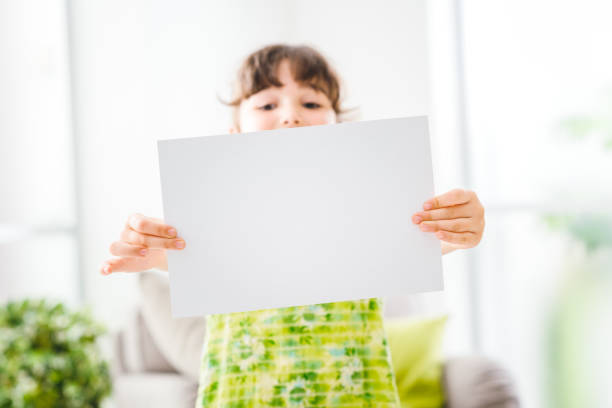 istock Cute girl holding a sign 862239508