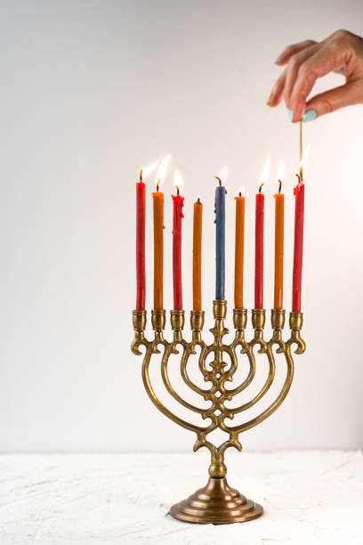 istock Light candles on chanukiah for the holiday side view 862245762