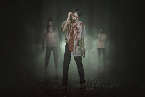 istock Some spooky asian zombies with blood walking around 862246112