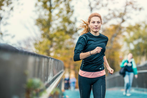 istock Female Athlete Running Outdoors 862246726