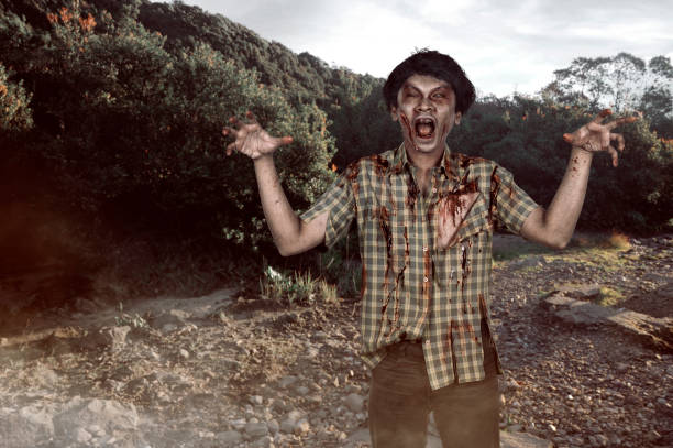 istock Scary asian zombie man with wounded face and claw hand 862251610