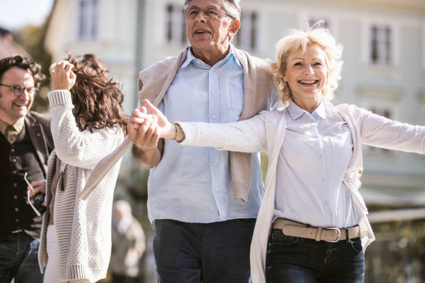 istock Mature Couples Walking Around Old Town 862251900