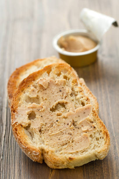 istock bread with fish pate on brown wooden background 862260854