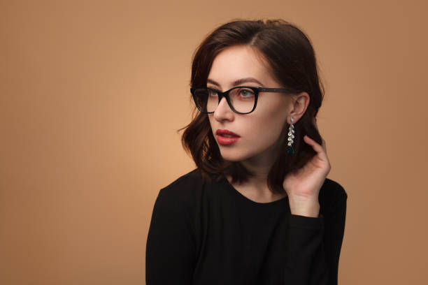 istock Girl in trendy glasses posing in studio 862261076