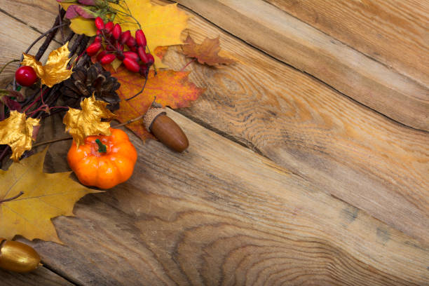 istock Thanksgiving background with pumpkin and golden maple leaves wreath, copy space 862262252