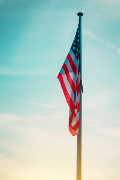 istock USA flag on pole in sunset 862262650