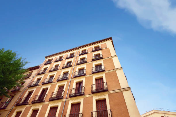 istock View of colorful paint old apartment with doors and balcony 862262948