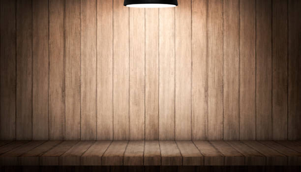 istock Interior wooden room with lamps and table on wall 862267250