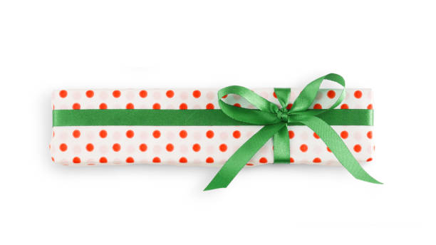 istock Gift box wrapped in white paper and green ribbon 862269866
