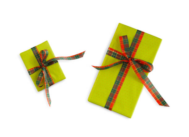 istock Gift box wrapped in green paper and bright ribbon 862270258