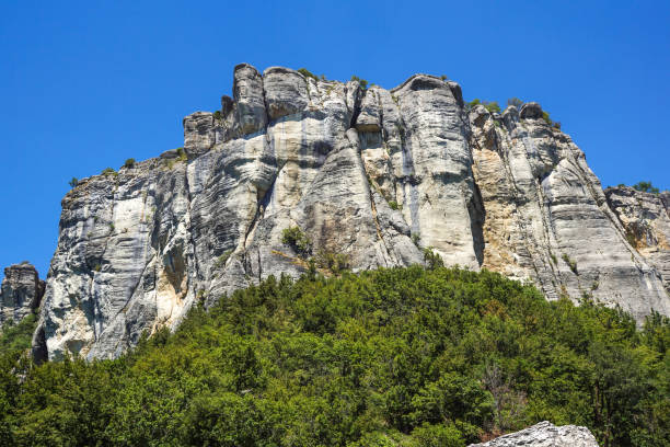 istock vertical mountain . Rock climbing the steep cliffs of the mountains . 862273884