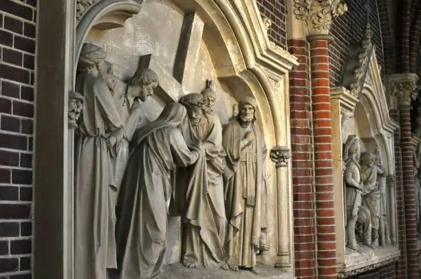 Fourth and fifth stations of the cross carvings in a church in Sittard, Netherlands.