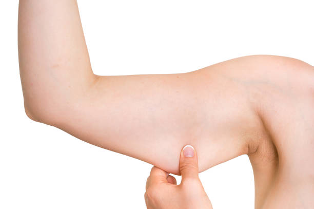 istock Woman is testing her muscle under her arm 862278976