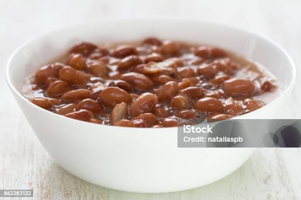 Boiled Beans In White Dish On White Wooden Background Stock Photo - Download Image Now