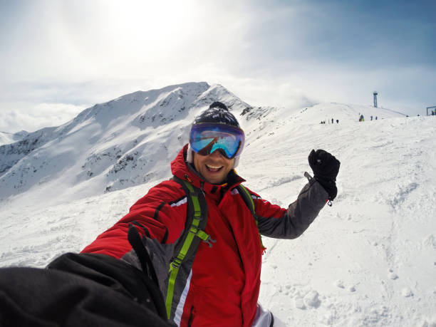 istock Selfie of man on snowy mountain 862283744