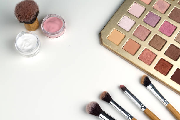 istock beauty concept : cosmetics top view on a white table. Workplace, cosmetic bag 862286456