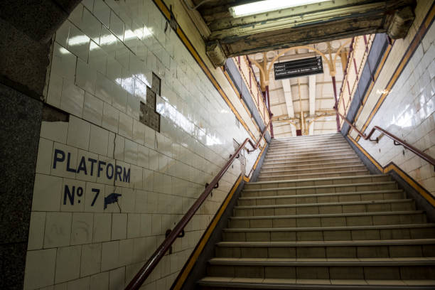 Stairs leading up to a train platform at Flinders Street Station, Melbourne, Australia