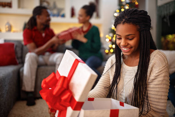 istock Girl opening box with Christmas gift 862290358