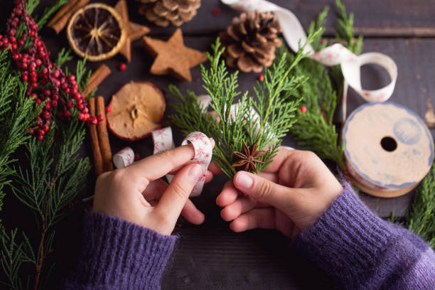 istock Woman hands making Christmas day gifts. 862291542