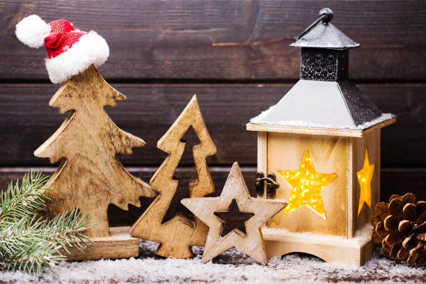 istock Burning lantern and christmas decoration in the evening. 862297208