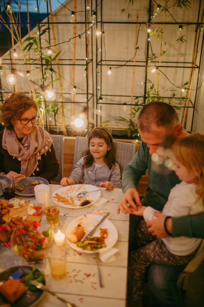 istock Lovely young family at Thanksgiving dinner 862305546