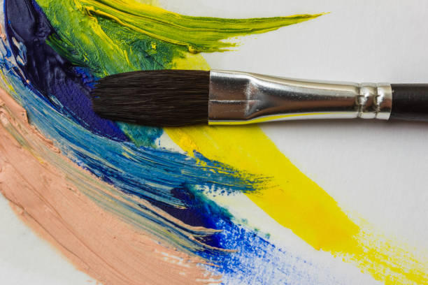 istock colored paints and brushes for painting 862307142