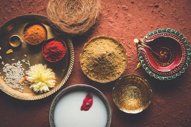 Abhyanga Snan on first day of Diwali - special herbal bath with ubtan or Utne, a mix herbal powder to have bath and scrub on the occasion of Diwali, selective focus