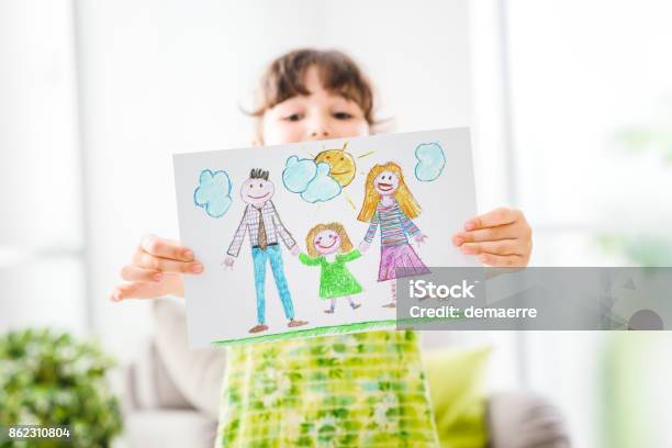 Cute Girl Holding A Sign Stock Photo - Download Image Now - Child, Drawing - Activity, Adoption