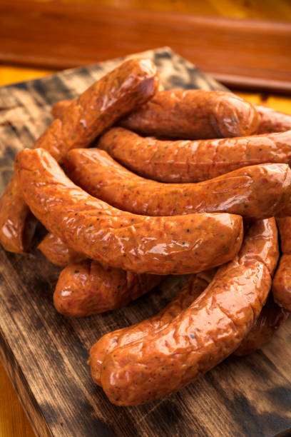 istock Smoked sausage on burnt cutting board 862313408