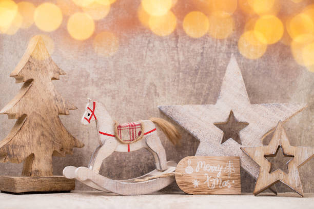 istock Christmas tree decorations on a wooden background. With bokeh ornaments. 862317724
