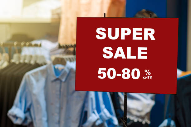 istock sale 50-80 off mock up advertise display frame setting over the stack of jeans and clothes line in the shopping department store for shopping, business fashion and advertisement concept0 off mock up advertise display frame setting over the stack of shirt 862324458