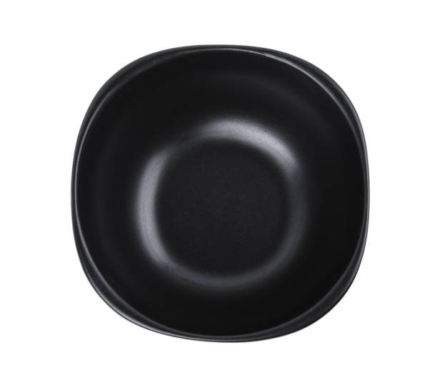 istock top view of empty black bowl isolated on white background 862326182