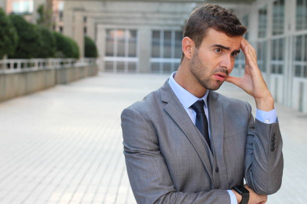 istock Businessman deep in thoughts close-up with copyspace 862326288
