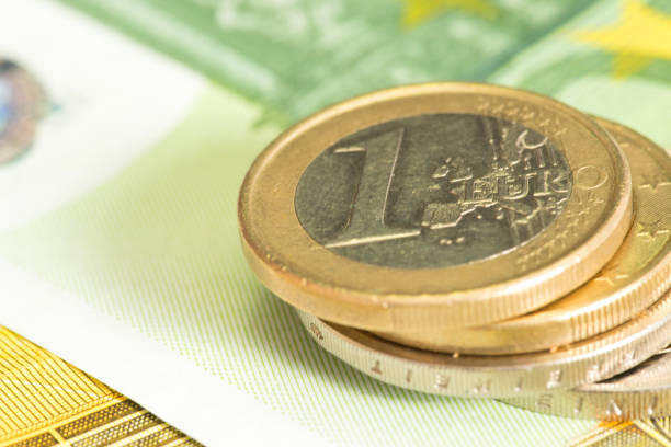 istock Euro banknotes and euro coins 862329632