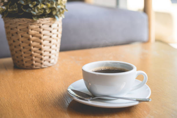 istock Coffee white cup , Black coffee on wood table ,warm and good smell 862337454