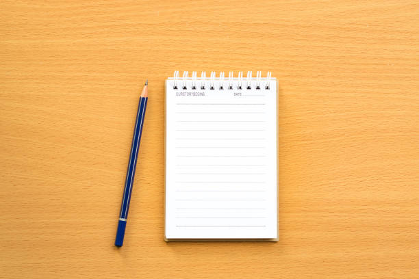 istock Notepad with pencil on wood board background.using wallpaper for education, business photo.Take note of the product for book with paper and concept, object or copy space. 862342880