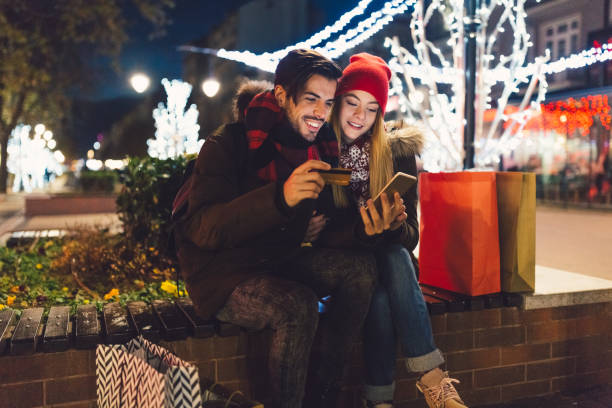 istock Happy couple using credit card for online shopping 862345900