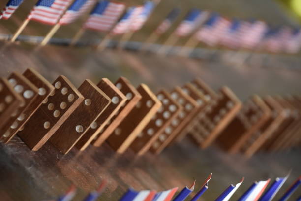 istock International flags and the domino effect 862346140