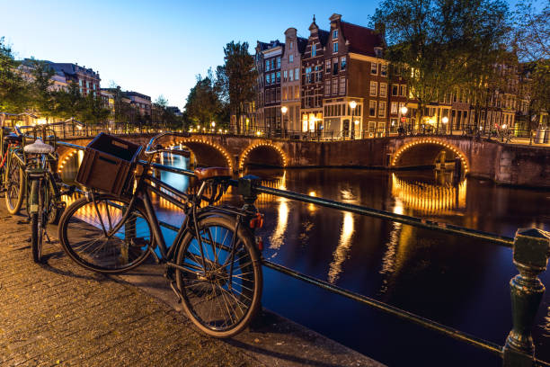 istock Amsterdam canals and bridges illuminated at night 862346582