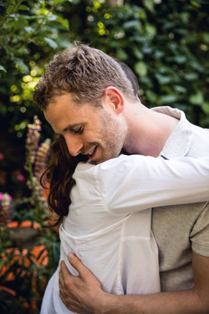 istock Young affectionate couple embracing at home 862346722