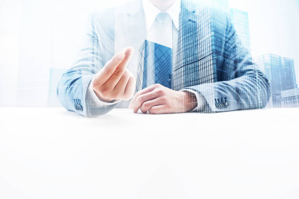istock Businessman Snapping Fingers with Double Exposure Cityscape 862348222