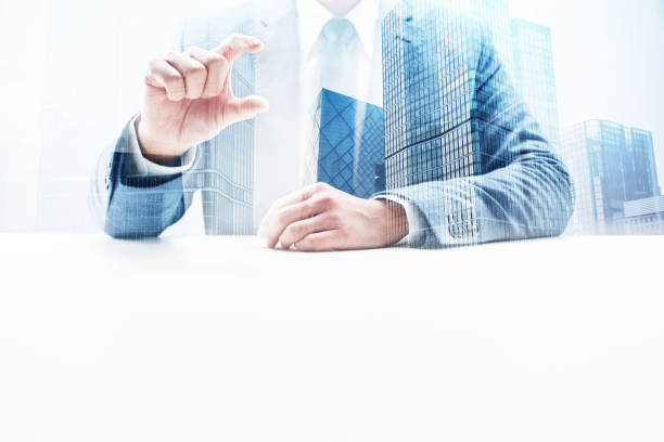 istock Businessman Griping Something Small with Double Exposure Cityscape 862350350