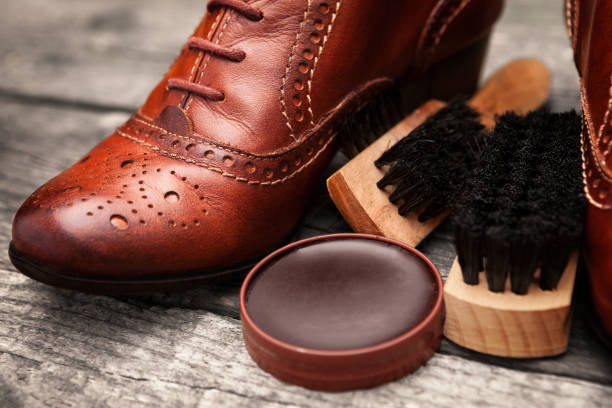 istock Shoe cream,brushes and brown leather shoes 862354454
