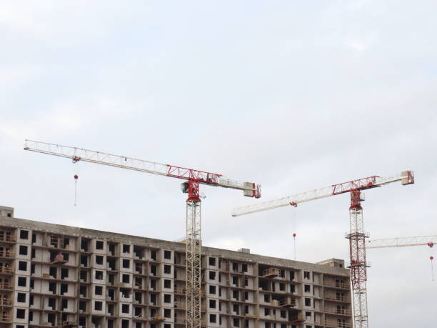 istock Construction of apartment houses tower cranes 862355280