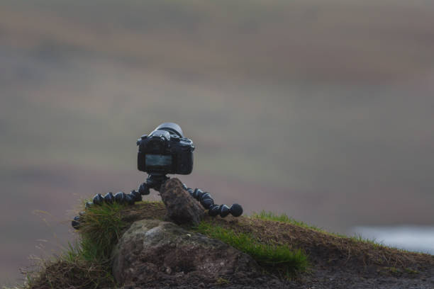 istock Photo camera on mobile tripod shooting time-lapse in Mountains rocks 862355428
